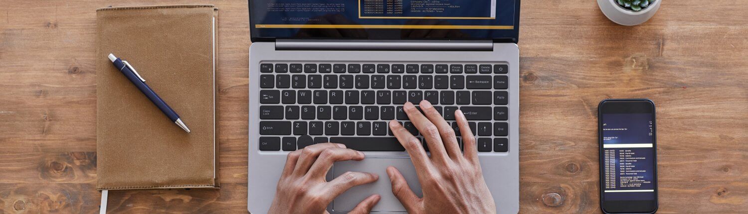 top down view: Man working with a laptop